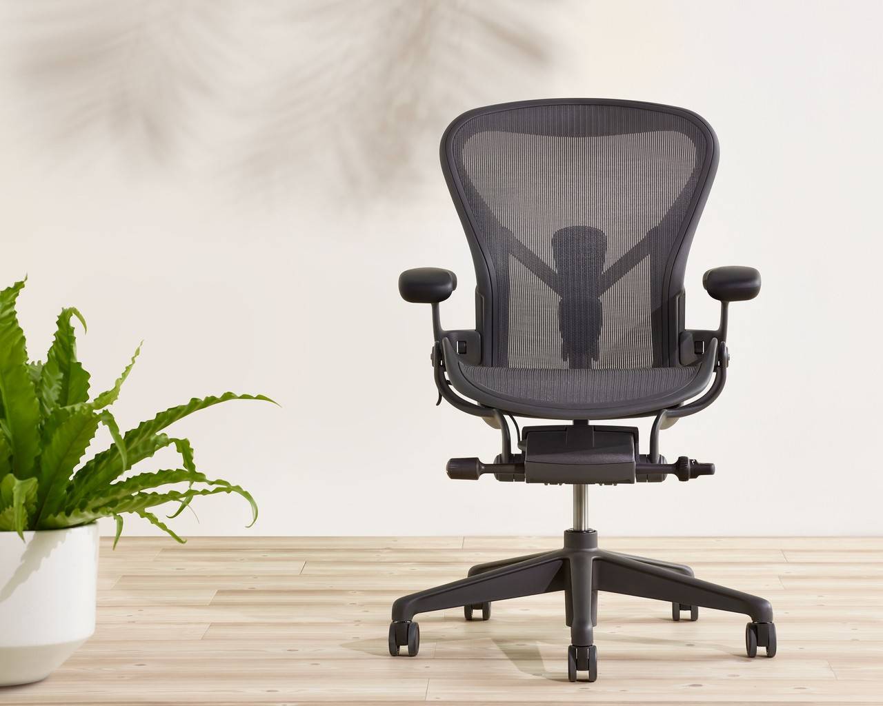 ergonomia corporativa Herman Miller cadeira Aeron escritório