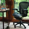 full 1 em Como Montar o Home Office Perfeito em 2026: Guia Completo de Ergonomia e Design home office perfeito com cadeira ergonômica Herman Miller